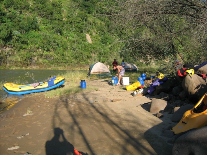 camping next to the river on our multi-day white water rafting trips on the Mkomazi River